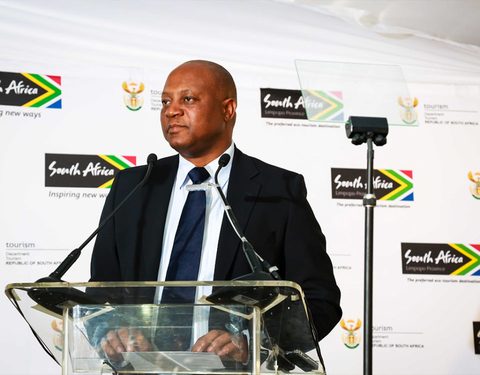 A speaker at a podium during a press event